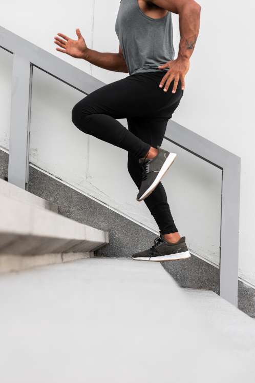A man running up the stairs