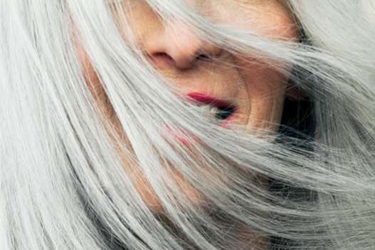 Wind flying across a woman's face