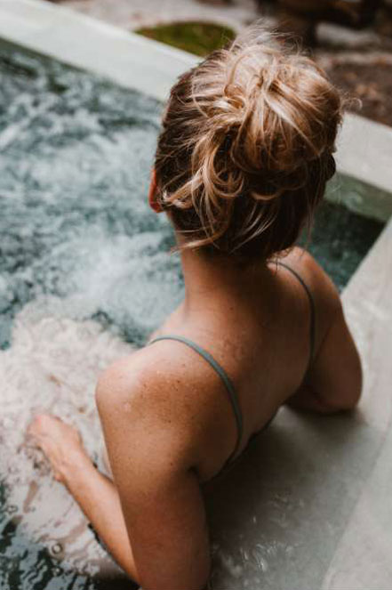 A woman enjoying some pool time